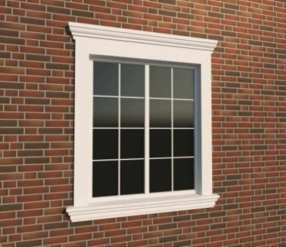 Вариант оформления окна фасадной лепниной